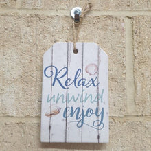 Load image into Gallery viewer, Display this beautifully crafted ceramic beach sign in any room to remind yourself to relax, unwind, and enjoy life. Its small size makes it perfect for hanging on walls &amp; doors. Let the peaceful ocean vibes wash over you with this charming novelty sign.