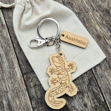 Load image into Gallery viewer, Elevate your keychain game with our sustainably made Gecko Wooden Keychain! Show your love for Australia - both its incredible wildlife and locally-made products. Each keychain is expertly crafted with sustainable materials, making it the perfect eco-friendly gift for yourself or a fellow tourist.