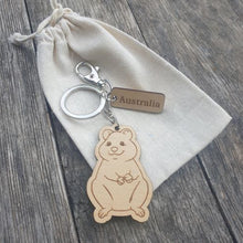 Load image into Gallery viewer, Elevate your keychain game with our sustainably made quokka Wooden Keychain! Show your love for Australia - both its incredible wildlife and locally-made products. Each keychain is expertly crafted with sustainable materials, making it the perfect eco-friendly gift for yourself or a fellow tourist.