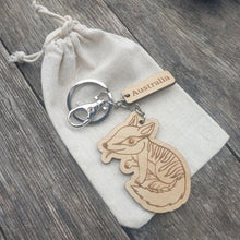 Load image into Gallery viewer, Elevate your keychain game with our sustainably made numbat Wooden Keychain! Show your love for Australia - both its incredible wildlife and locally-made products. Each keychain is expertly crafted with sustainable materials, making it the perfect eco-friendly gift for yourself or a fellow tourist.