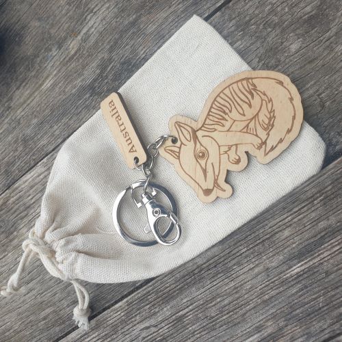 Elevate your keychain game with our sustainably made numbat Wooden Keychain! Show your love for Australia - both its incredible wildlife and locally-made products. Each keychain is expertly crafted with sustainable materials, making it the perfect eco-friendly gift for yourself or a fellow tourist.