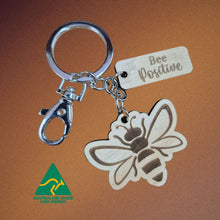 Load image into Gallery viewer, Bee Gifts | Adorable Australian Made Timber Bee Keychains With Assorted Bee Sayings | Display Stand