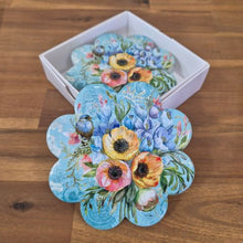 Load image into Gallery viewer, Enhance your home decor with our Garden Flower Blue Coasters. These ceramic table coasters feature a charming blue bird and flower design, perfect for garden and bird lovers alike. Each set comes boxed for easy gifting. Protect your tabletops in style with our beautiful coasters.  Design available in trivet - cheeseboard &amp; serving tray.