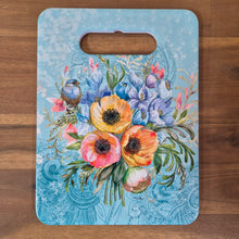 Load image into Gallery viewer, This ceramic cheeseboard features a charming blue bird design, perfect for any garden-inspired kitchen. Crafted from high-quality materials, it provides a beautiful and functional surface for serving cheeses and snacks. Elevate your hosting game with this unique addition to your kitchen decor.  Ceramic | Gloss finish | Cork non slip backing | Hand grip | Decorative and functional gift | 24 x 18 cm&nbsp;