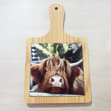 Load image into Gallery viewer, Introducing our Cartoon Cow Cheeseboard! Perfect for serving delicious snacks or as a unique kitchen decor piece. Made for cow lovers, this cheeseboard is a fun and functional gift. Showcase your love for cows with this charming and durable cheeseboard.