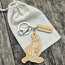 Load image into Gallery viewer, Elevate your keychain game with our sustainably made Kangaroo Wooden Keychain! Show your love for Australia - both its incredible wildlife and locally-made products. Each keychain is expertly crafted with sustainable materials, making it the perfect eco-friendly gift for yourself or a fellow tourist.