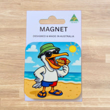 Load image into Gallery viewer, Pelican Magnet | Shorts Thongs Beach Pie Eating Pelican | Australian Made Aussie Themed Gift