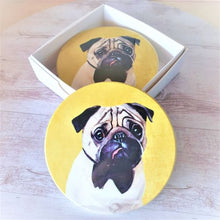 Load image into Gallery viewer, Protect your furniture in style with these adorable Dog Coasters. Featuring a cute pug design, these coasters are the perfect gift for any dog lover. Made with high-quality materials, these coasters are durable and will keep your table and bar surfaces free from spills and stains.&nbsp;  Round | Gloss finish | Cork non slip backing | White gift box with lid | Diameter 10 cm | Set of 4 - same design.