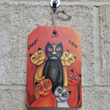 Load image into Gallery viewer, Show your love for all things feline with our Cat Hanging Sign Gift! This Crazy Cat Lady Ceramic Plaque Sign is the perfect addition to any cat lover&#39;s home. Display your love for cats with pride and add a touch of whimsy to your decor. The perfect gift for any cat person!