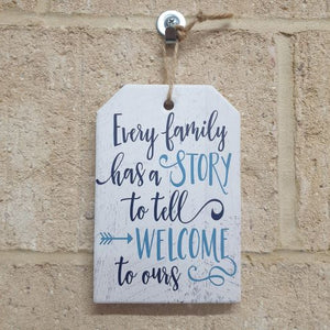 This ceramic hanging sign is the perfect family home gift. Display the heartwarming message "Every Family Has A Story To Tell, Welcome To Ours" in any room of your home. Celebrate the unique story of your family with this charming and sentimental piece.