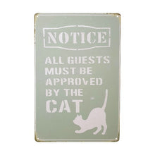 Load image into Gallery viewer, Display your love for your feline friend with our Cat Metal Sign Gift! This sign features a humorous message &quot;Notice All Guests Must Be Approved By The Cat&quot;, perfect for any cat lover. Made of durable metal, it&#39;s a great addition to any home decor. Get yours now and let your guests know who&#39;s really in charge.