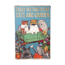 Load image into Gallery viewer, This cat metal sign makes the perfect gift for any cat lover. With its humorous message &quot;Easily Distracted By Cats And Garden,&quot; it&#39;s sure to bring a smile to their face. Made with high-quality materials, this sign is a durable and long-lasting addition to any home decor.