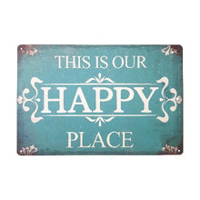 Load image into Gallery viewer, This metal sign is the perfect gift for any home, boldly declaring &quot;This Is Our Happy Place&quot;. Crafted with durable metal, it adds a touch of charm to any space. Share the joy and positive message of home with loved ones.