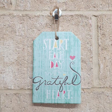 Load image into Gallery viewer, Start each day with a grateful heart with this small ceramic sign gift. Hang it anywhere as a reminder to appreciate the little things in life. A perfect gift for anyone who needs a positive boost.