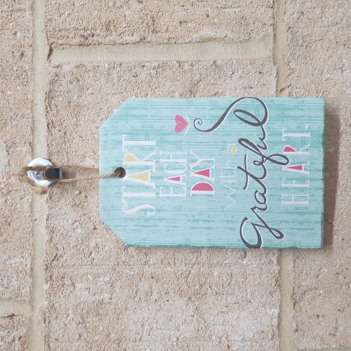 Start each day with a grateful heart with this small ceramic sign gift. Hang it anywhere as a reminder to appreciate the little things in life. A perfect gift for anyone who needs a positive boost.