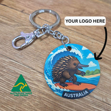 Load image into Gallery viewer, Australian Made Keychain | Australiana Surfs Up Echidna Character | Custom Add Your Logo