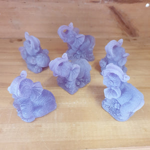 Set of 6 different purple poly resin lucky Elephants - matt finish.   Lucky Elephants represent strength, protection, wisdom and good luck.  Place around your home for lucky home Feng Shui. purple resin statues - Six different statues in set - Stone look finish - average height 5 cm.