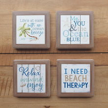 Load image into Gallery viewer, Beach Life Magnet Set - Ocean Themed Kitchen Fridge Magnets - Set Of 4. A beautiful set of 4 x ceramic beach / ocean themed magnets with sayings.  Life&#39;s at ease with an ocean breeze Me you &amp; the ocean blue Relax - Unwind - Enjoy I need beach therapy The perfect gift for any beach house or lover of the ocean.  4 x ceramic magnets - Matt finish - Diameter 5 cm - Magnetic backing.