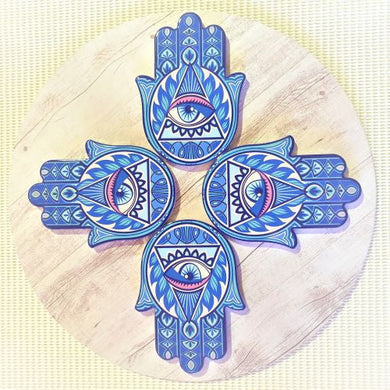 Protect your surfaces in style with our Hamsa Hand Of Protection Coasters Set. This set of 4 coasters features the traditional hamsa design, believed to bring protection and good fortune. A perfect gift for anyone who values both aesthetics and cultural traditions.