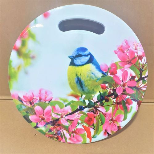 A colourful mix of blue, yellow, white and green makes the blue tit one of our most attractive and most recognisable in the UK & Europe.  Our stunning Blue Tit round trivet /sign is the perfect gift to brighten up any kitchen. You can even hang this beautiful image and display these beautiful colours.   This beautiful design is the perfect gift for lovers of birds.