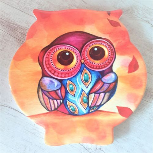 Our beautiful colourful owl is the perfect gift to brighten up any passionate owl lovers kitchen or table.  Quality ceramic | Owl shaped | Cork non slip backing | 16 x 16 cm | Glossy finish | Protect your bench tops from hot pots, use as a large coaster or display to brighten up kitchen.    This beautiful colourful owl design is also available in table coasters.  View our full range of gifts, we have something for everyone - Keychains & Gifts Australia.