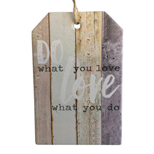 Load image into Gallery viewer, Do What You Love - Love What You Do. Hanging ceramic plaque sign.  Perfect uplifting gift, or just a beautiful inspirational sign for yourself.  10 x 15 cm - Ceramic - Cork backing - Rope hanger - Colour as shown in photo.  View our shop today for more beautiful gifts - Keychains &amp; Gifts Australia   Do all things with love gift - Hanging sign - Hanging plaque - Love gift 
