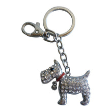 Load image into Gallery viewer, Cute silver stone Scotty dog key / bag chain. The Scottish Terrier was a working breed in the Scottish Highlands, but is now a loved dog breed through out the world. Perfect for any dog lover or Scotty dog owner.  All orders come in a beautiful organza gift bag ( colours may vary ) - Scotty dog 4.5 x 5 cm - Full keychain length 10cm - Silver - Rhinestone&#39;s   Please note Scotty dog collars colours may vary in colour to photo