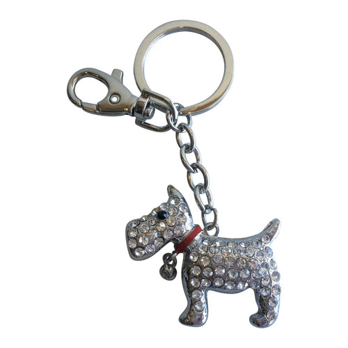 Cute silver stone Scotty dog key / bag chain. The Scottish Terrier was a working breed in the Scottish Highlands, but is now a loved dog breed through out the world. Perfect for any dog lover or Scotty dog owner.  All orders come in a beautiful organza gift bag ( colours may vary ) - Scotty dog 4.5 x 5 cm - Full keychain length 10cm - Silver - Rhinestone's   Please note Scotty dog collars colours may vary in colour to photo