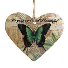 Load image into Gallery viewer, Our beautiful hanging green Butterfly heart plaque has the beautiful words - Be Your Own Kind Of Beautiful.  What a perfect gift to gift. This beautiful butterfly design is also available in coasters.  18 x 19 cm Heart shaped rope hanging heart. Ceramic - Rope hanger