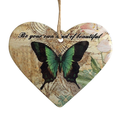 Our beautiful hanging green Butterfly heart plaque has the beautiful words - Be Your Own Kind Of Beautiful.  What a perfect gift to gift. This beautiful butterfly design is also available in coasters.  18 x 19 cm Heart shaped rope hanging heart. Ceramic - Rope hanger