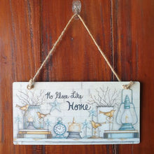 Load image into Gallery viewer, This wooden hanging sign makes a beautiful gift for any home. The timeless message, &quot;No Place Like Home&quot; adds a touch of warmth to any living space. Perfect for family and friends, this home decor piece brings a sense of comfort and nostalgia to any room.