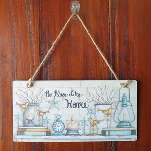 This wooden hanging sign makes a beautiful gift for any home. The timeless message, "No Place Like Home" adds a touch of warmth to any living space. Perfect for family and friends, this home decor piece brings a sense of comfort and nostalgia to any room.