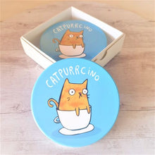 Load image into Gallery viewer, Our adorable funny Catpurrcino cat coasters are the purrrfect cat lovers gift.  Boxed set of 4 same design | Blue | Ceramic | Cork backing | Diameter 10cm.  Design also available in kitchen trivet &amp; magnet | View our shop for the purrrfect gift - Keychains &amp; Gifts Australia.