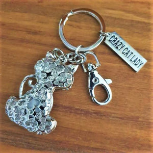     Registered Trade Mark Crazy Cat Lady  Our Crazy Cat Lady designed keychain | bag chain | keyring is a very popular choice for cat lovers. Your Keychain comes boxed ready to give gift.  Crystal rhinestone gem | CRAZY CAT LADY tag | Silver | Gift Boxed 6 x 14 cm .   View our full range of cat gifts - Keychains & Gifts Australia 