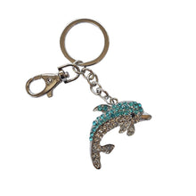 Load image into Gallery viewer, Beautiful hand made crystal stone Dolphin keyring / bag Chain is the perfect gift for any Dolphin lover.  Dolphins are loved all over the world as one of our most beautiful animals.  Dolphins Symbolize harmony, protection and joy.  Keychains 6 x 8 x 11 cm - Comes in organza gift bag ( colours will vary ) - Silver &amp; blue rhinestones - Silver keychain 