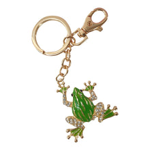 Load image into Gallery viewer, Our beautiful green tree frog keychain is the perfect gift for frog lovers.  Bright green hand painted frog with beautiful silver rhinestones | Frog 5 x 5 cm | Full length of keychain 12 cm | Gold metal | Comes in a  beautiful organza cotton gift bag - colours will vary.  Frogs represent wealth, abundance, ancient wisdom, rebirth, and good luck. Green frog keyring Green frog keychain green frog gift