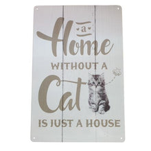 Load image into Gallery viewer, Enhance your home decor with this metal sign, perfect for any cat lover. Our &quot;A Home Without A Cat Is Just A House&quot; sign serves as a constant reminder of the joy a feline companion brings. Show your love for your furry friend with this thoughtful and stylish gift.