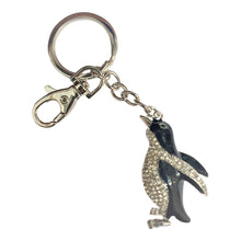 Load image into Gallery viewer, Our super cute hand made penguin keyring will be the perfect gift for penguin lovers.  Hand painted | Silver rhinestones | Silver metal | Penguin 3.5 x 5 cm | Full length of keychain 12 cm | Our cute penguin will come in a beautiful cotton organza gift bag - colours will vary. 