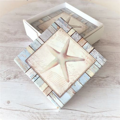 Elevate your coastal home decor with our Seaside Starfish Ocean Coasters. Each set includes 4 beautifully designed coasters, perfect for showcasing your love for the beach. These coasters feature a charming starfish design, making them a must-have for ocean lovers. Protect your surfaces while adding a touch of seaside charm to your space.